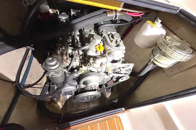 Seahawk Yacht Photos Pics Engine compartment of a 2004 PDQ 34 Power Catamaran, showcasing mechanical components.