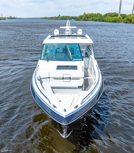 Ski 2 Sea Yacht Photos Pics 2017 Formula 430 Super Sport Crossover boat cruising on a river.