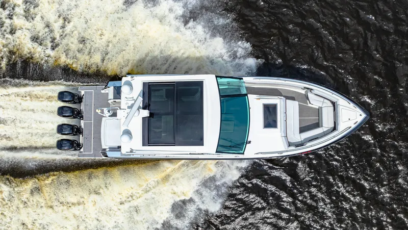 Ski 2 Sea Yacht Photos Pics 2017 Formula 430 Super Sport Crossover boat cruising on water, aerial view.