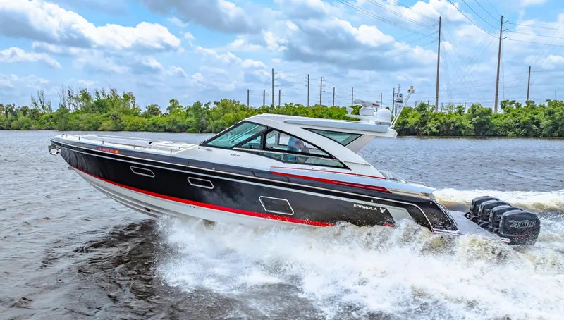 Ski 2 Sea Yacht Photos Pics 2017 Formula 430 Super Sport Crossover boat cruising on a river.