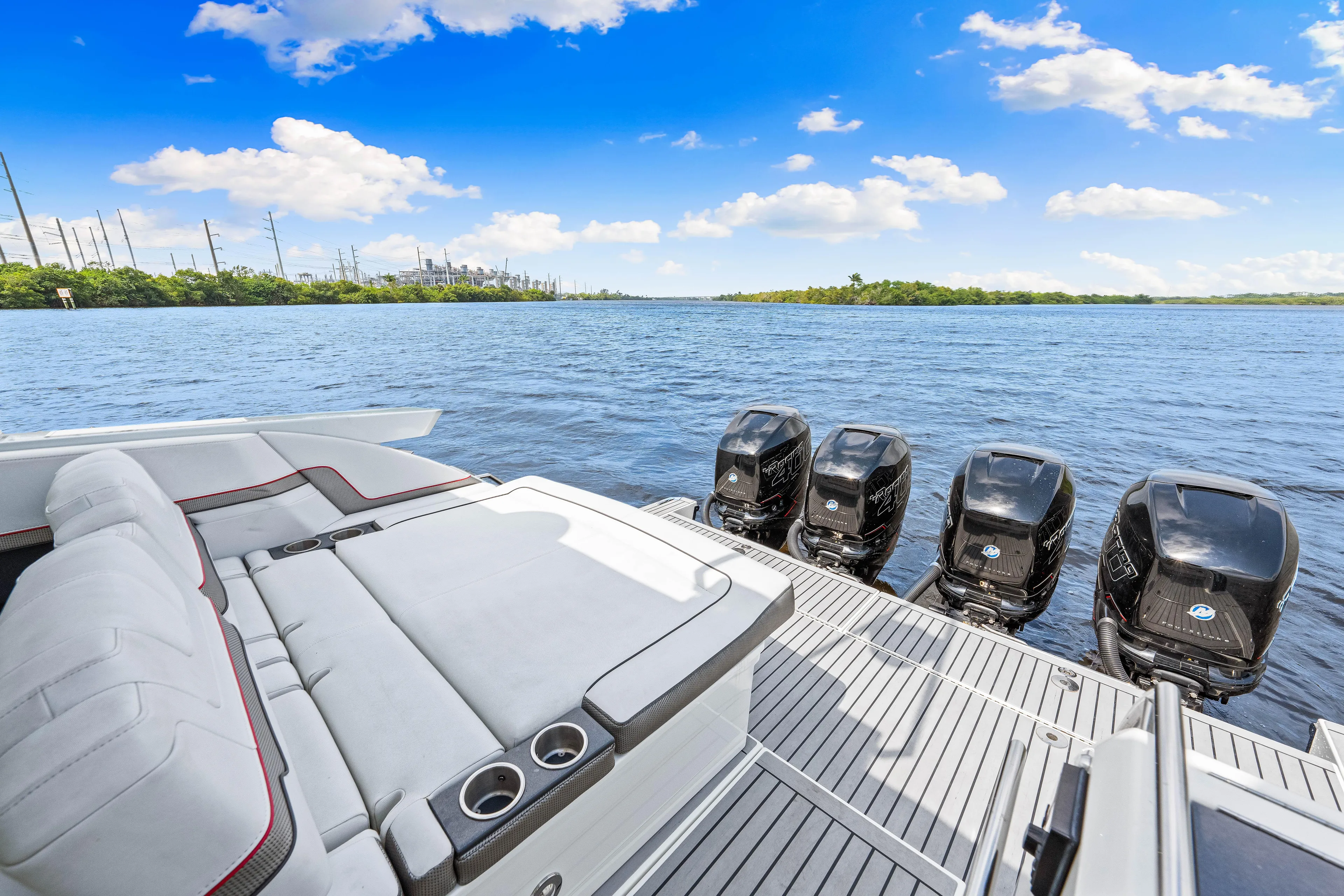 Ski 2 Sea Yacht Photos Pics 2017 Formula 430 Super Sport Crossover boat with quad outboard engines on a sunny day.