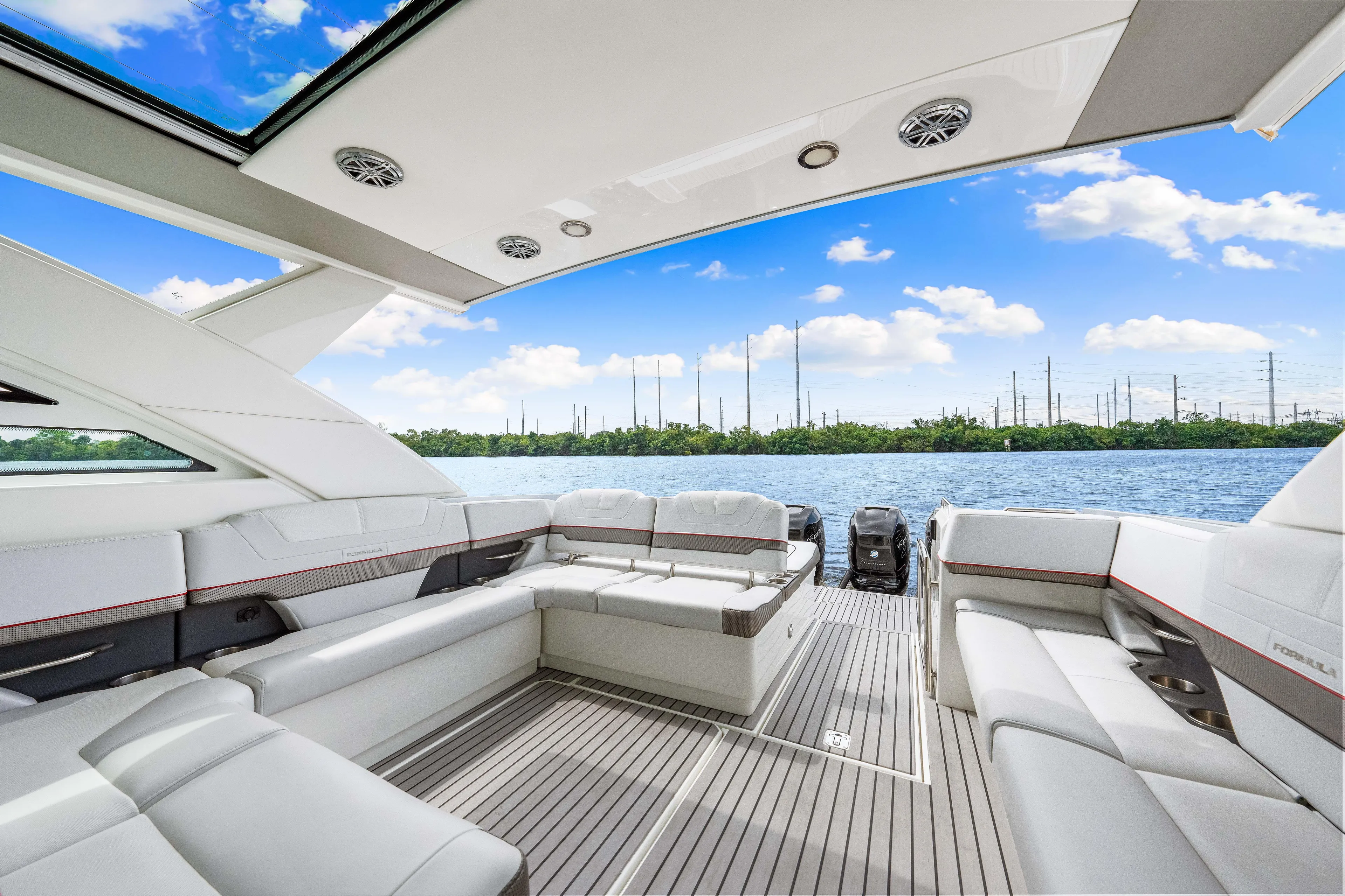 Ski 2 Sea Yacht Photos Pics 2017 Formula 430 Super Sport Crossover luxury yacht interior with spacious seating and scenic water view.
