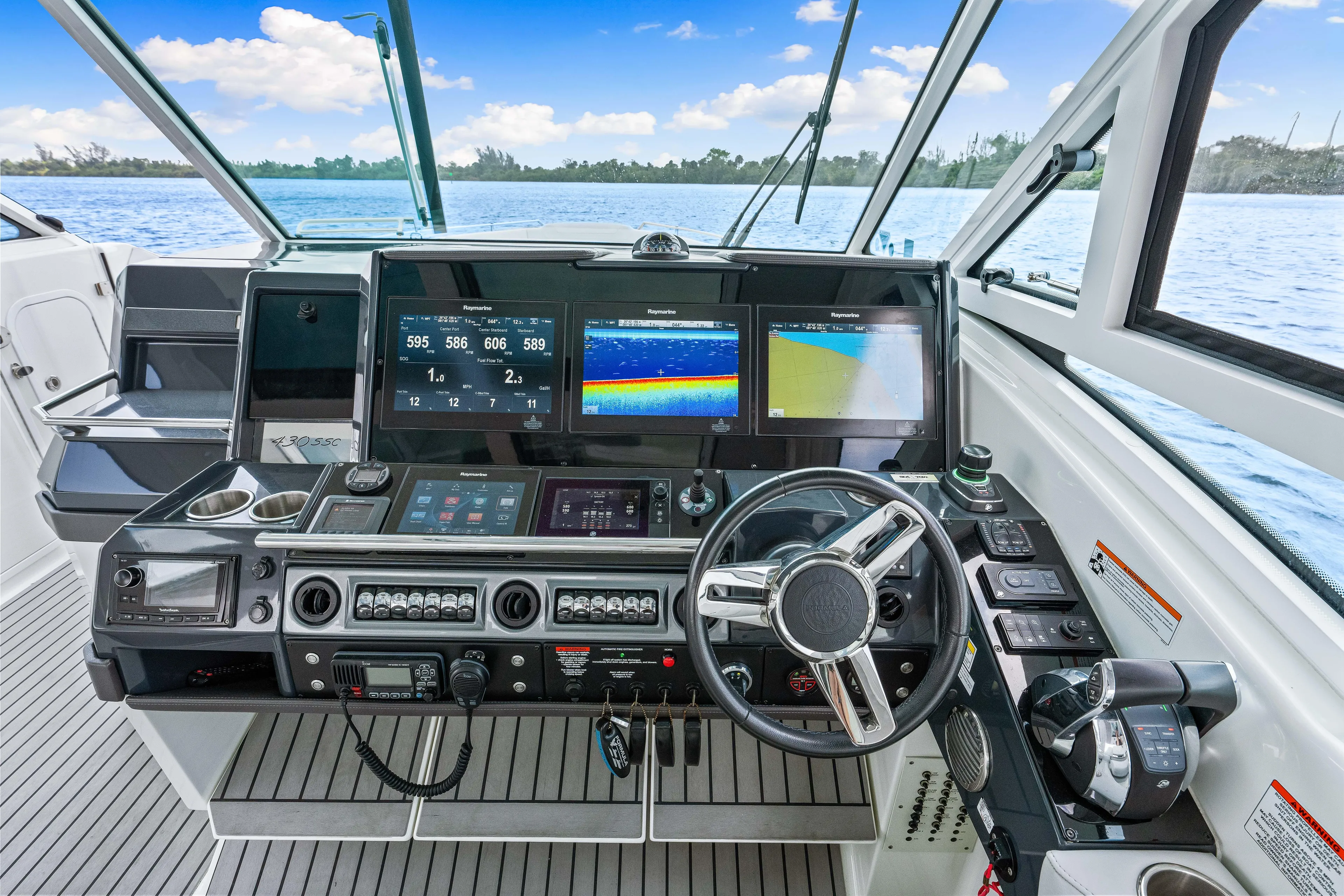 Ski 2 Sea Yacht Photos Pics 2017 Formula 430 Super Sport Crossover helm with advanced navigation systems and controls.