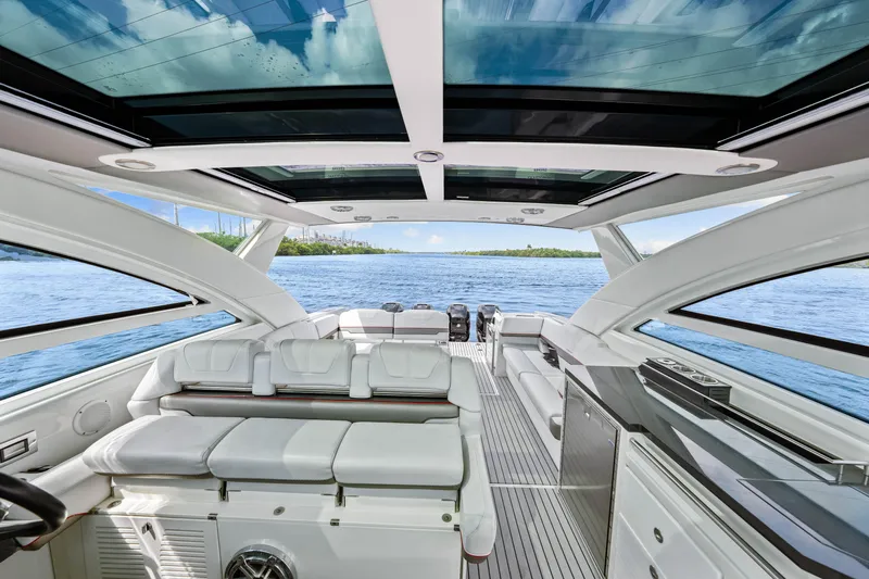 Ski 2 Sea Yacht Photos Pics 2017 Formula 430 Super Sport Crossover luxury yacht interior with panoramic windows and plush seating.