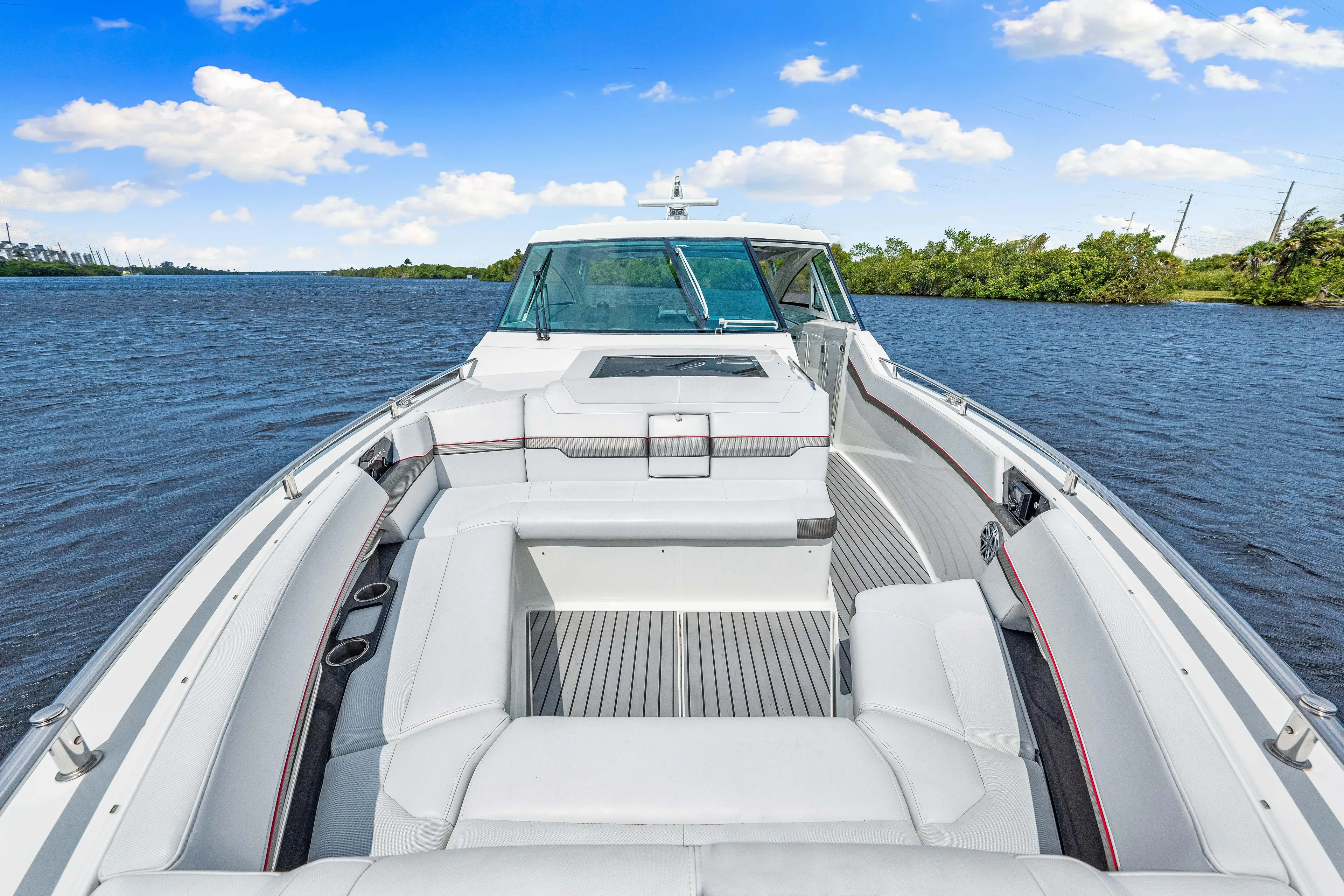 Ski 2 Sea Yacht Photos Pics 2017 Formula 430 Super Sport Crossover boat on a sunny day, spacious seating area.