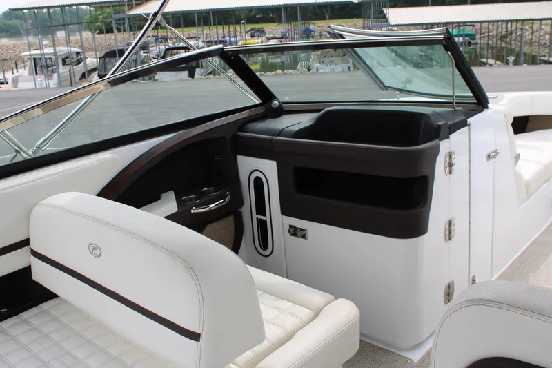  Yacht Photos Pics 2020 Cobalt R30 boat interior with white seating and sleek dashboard design.