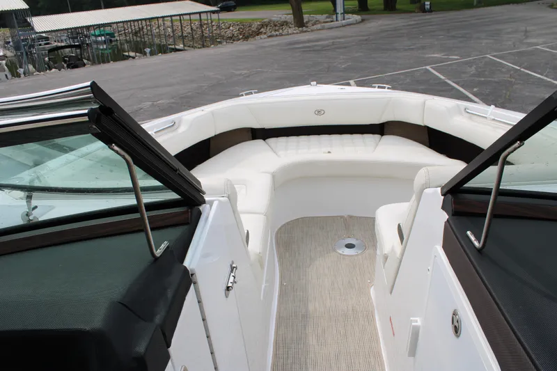  Yacht Photos Pics 2020 Cobalt R30 boat interior with white seating and open deck view.