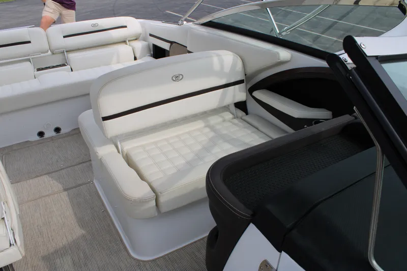  Yacht Photos Pics 2020 Cobalt R30 boat interior with white cushioned seating and sleek design.