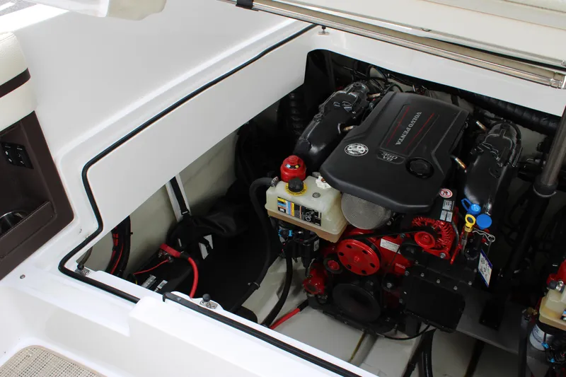  Yacht Photos Pics Engine compartment of a 2020 Cobalt R30 boat, showcasing a well-organized engine layout.