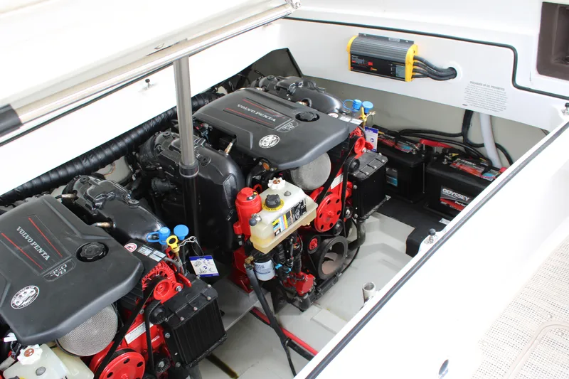  Yacht Photos Pics Engine compartment of a 2020 Cobalt R30 boat, featuring dual engines and battery setup.
