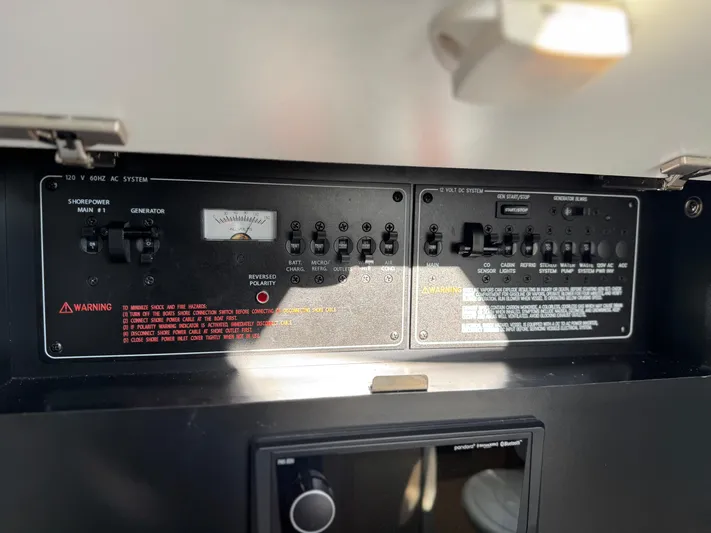 Sunny No Showers Yacht Photos Pics Control panel of 2023 Formula 350 Crossover Bowrider OB, featuring switches and gauges.