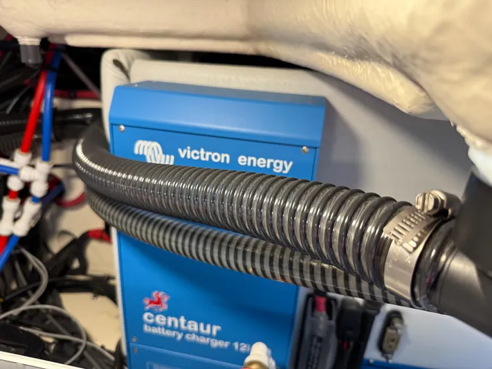 Sunny No Showers Yacht Photos Pics Victron Energy Centaur battery charger in 2023 Formula 350 Crossover Bowrider OB.