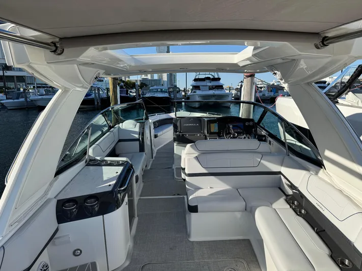 Sunny No Showers Yacht Photos Pics 2023 Formula 350 Crossover Bowrider OB interior with luxurious seating and modern design.