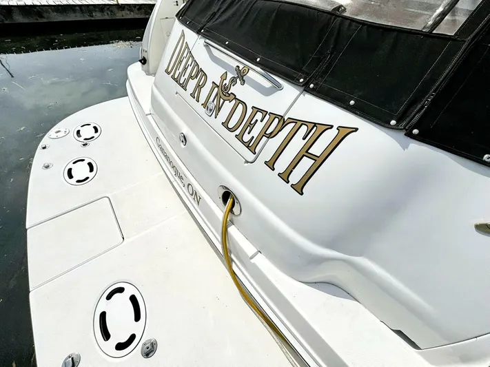  Yacht Photos Pics 2000 Sea Ray 410 Sundancer boat with "Deep N Depth" name on the stern.