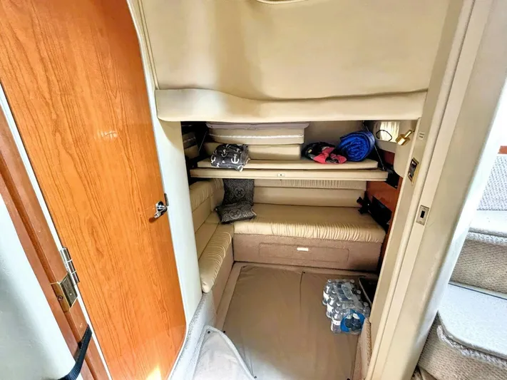  Yacht Photos Pics Interior cabin of 2000 Sea Ray 410 Sundancer with cozy seating and storage.
