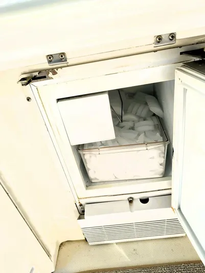  Yacht Photos Pics Ice maker on a 2000 Sea Ray 410 Sundancer yacht, filled with ice cubes.