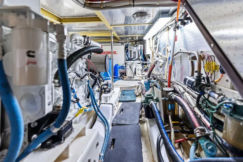  Yacht Photos Pics Engine room of a 2000 Selene Solo yacht, featuring complex machinery and piping systems.