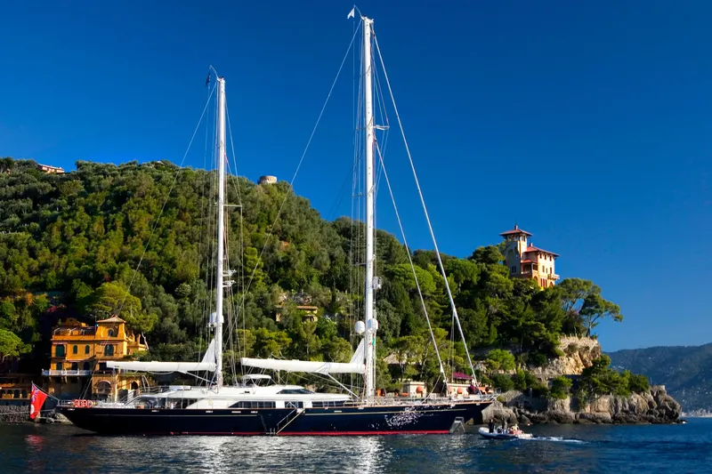 Tamsen Yacht Photos Pics Luxurious 2007 Perini Navi 52M yacht sailing near scenic coastal villas.