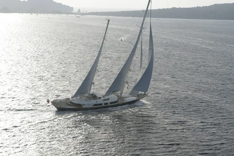 Tamsen Yacht Photos Pics Sailing yacht Perini Navi 52M, 2007 model, gliding on open sea.