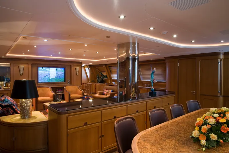 Tamsen Yacht Photos Pics Luxurious interior of 2007 Perini Navi 52M yacht with elegant wood finishes and modern decor.