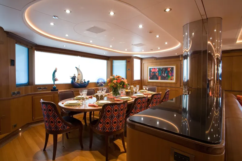 Tamsen Yacht Photos Pics Luxurious dining area on 2007 Perini Navi 52M yacht with elegant decor and ambient lighting.