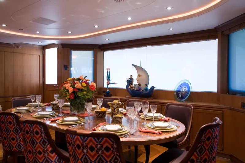 Tamsen Yacht Photos Pics Luxurious dining area on 2007 Perini Navi 52M yacht, featuring elegant table setting and decor.