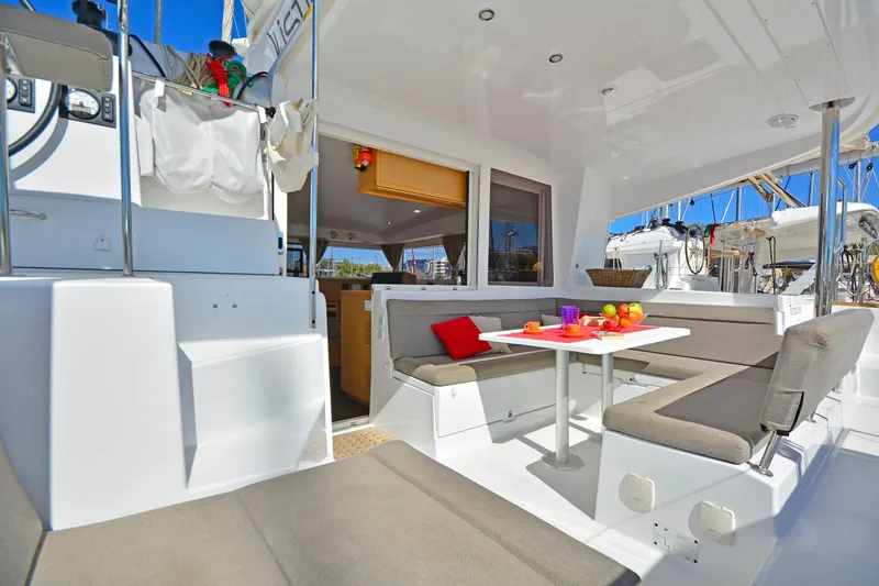  Yacht Photos Pics 2017 Lagoon 400 S2 yacht interior with cozy seating and dining area.