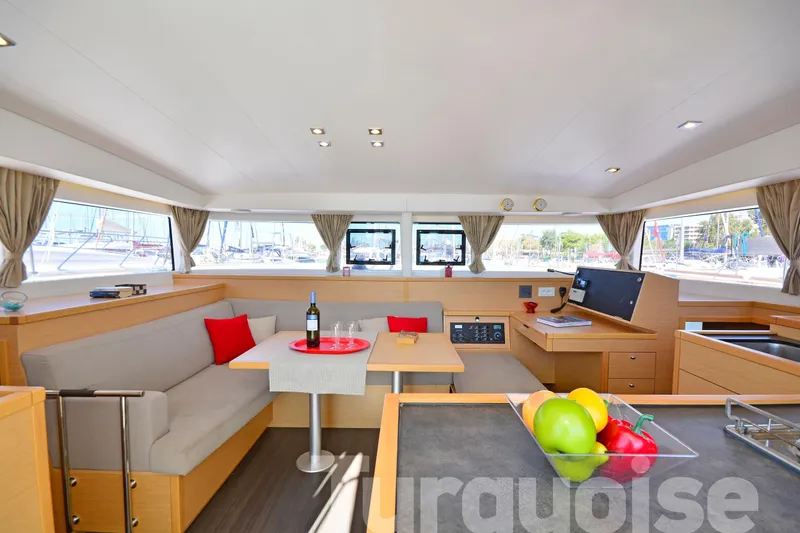  Yacht Photos Pics Interior of 2017 Lagoon 400 S2 catamaran with modern design and cozy seating area.