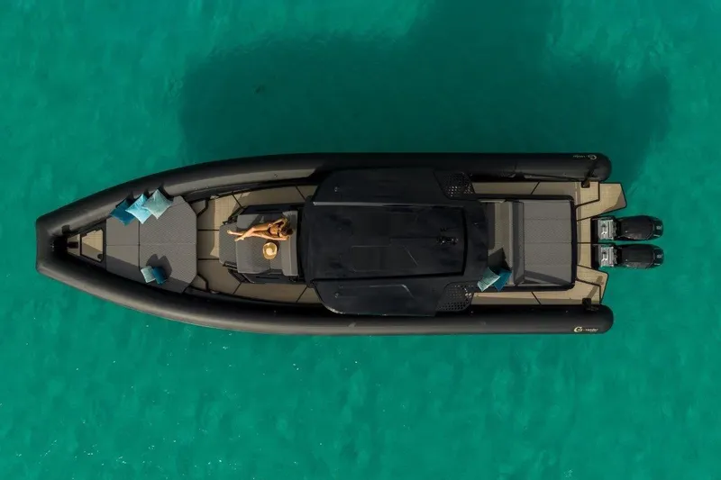  Yacht Photos Pics Aerial view of 2026 G-Tender DIECI4 boat on turquoise water.