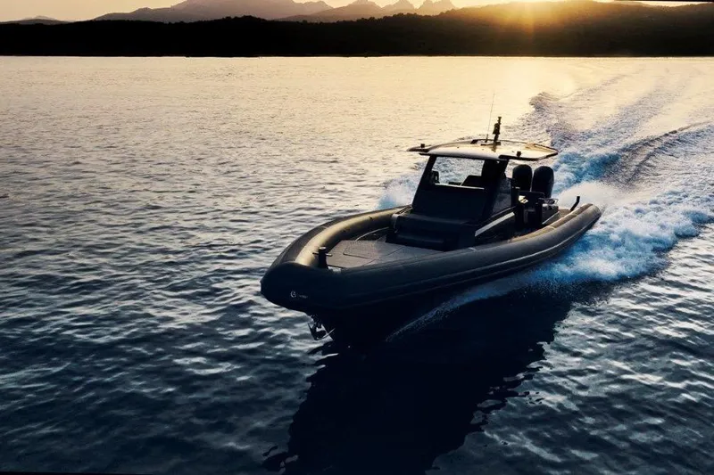  Yacht Photos Pics 2026 G-Tender DIECI4 boat cruising at sunset on open water.