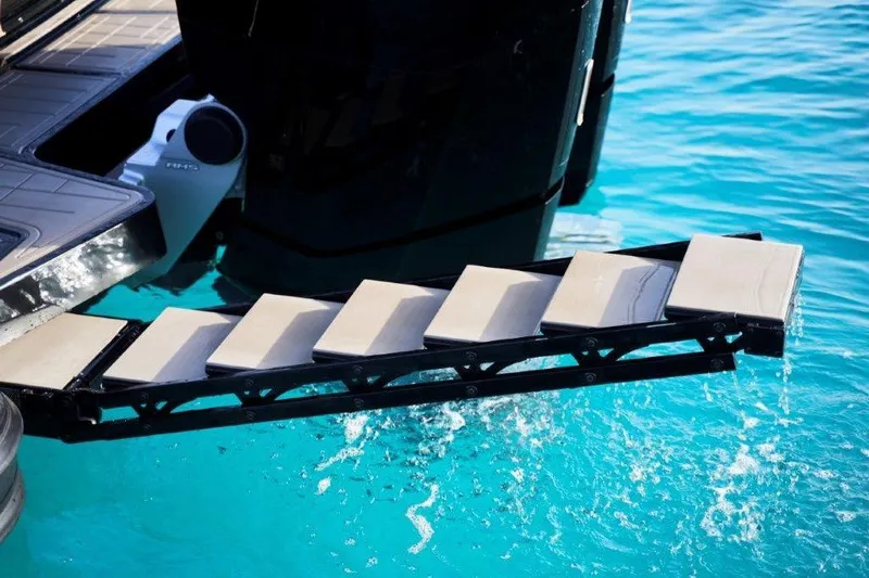  Yacht Photos Pics G-Tender DIECI4 2026 yacht with retractable swim platform over turquoise water.