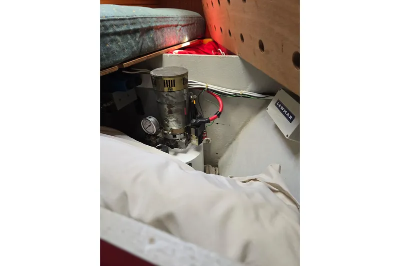 Georgia B Yacht Photos Pics Engine compartment of 2000 Hallberg-Rassy 42F Mk II sailboat, featuring mechanical components.