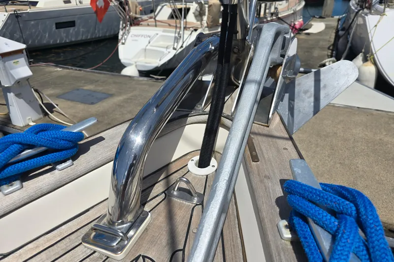 Georgia B Yacht Photos Pics Deck of 2000 Hallberg-Rassy 42F Mk II yacht with anchor and blue ropes.