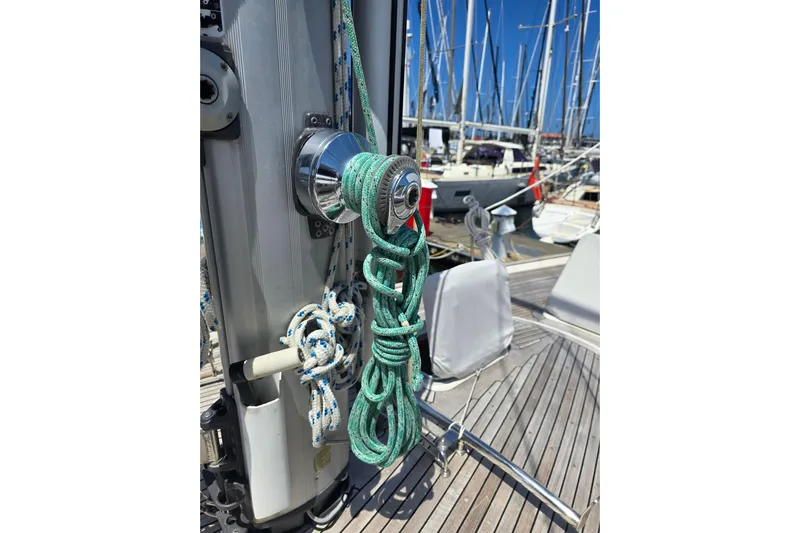 Georgia B Yacht Photos Pics Hallberg-Rassy 42F Mk II sailboat deck with ropes and winch, 2000 model.