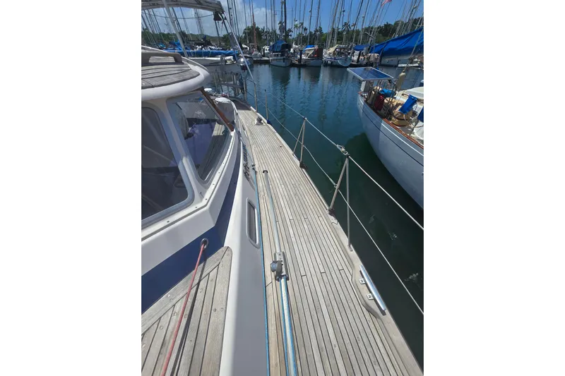 Georgia B Yacht Photos Pics Deck view of 2000 Hallberg-Rassy 42F Mk II yacht in marina.