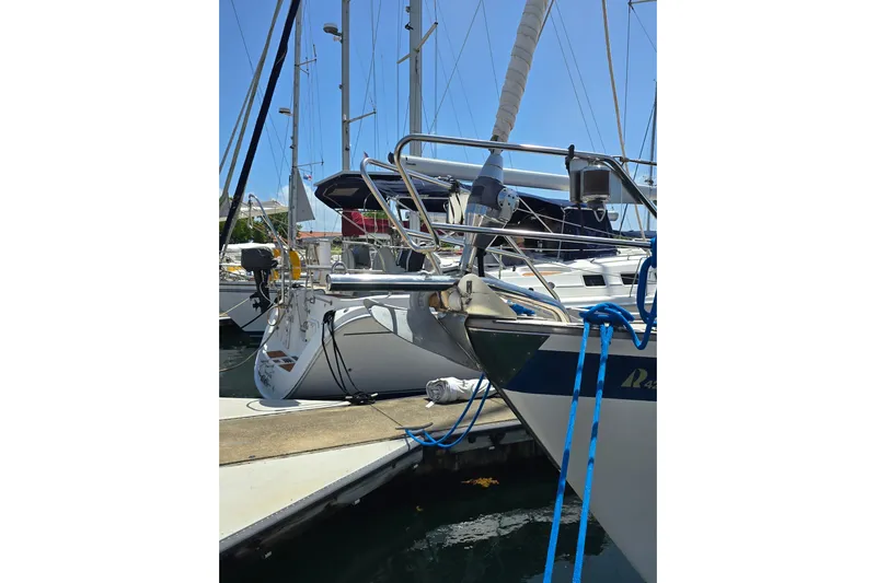 Georgia B Yacht Photos Pics Sailboat docked at marina, Hallberg-Rassy 42F Mk II, 2000 model, with blue ropes.