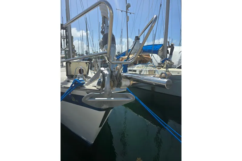 Georgia B Yacht Photos Pics Hallberg-Rassy 42F Mk II sailboat, 2000 model, docked with visible anchor and blue ropes.