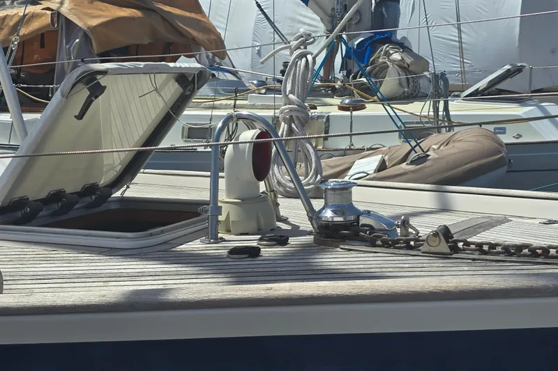 Georgia B Yacht Photos Pics Deck of 2000 Hallberg-Rassy 42F Mk II sailboat with open hatch and winch.