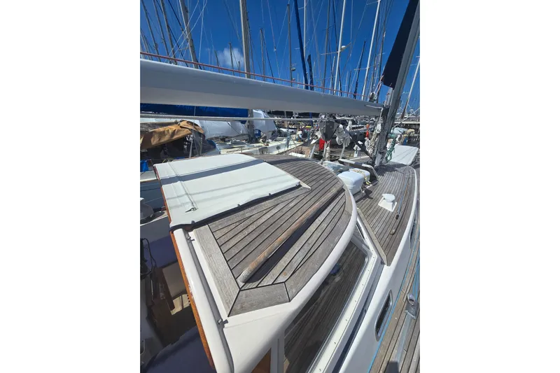 Georgia B Yacht Photos Pics Deck view of 2000 Hallberg-Rassy 42F Mk II sailboat in marina.