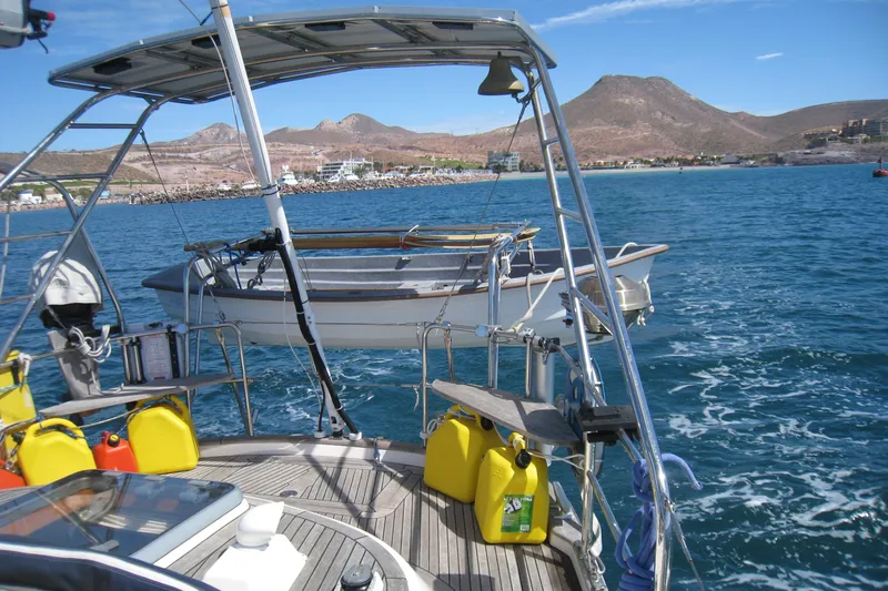 Georgia B Yacht Photos Pics Sailing yacht Hallberg-Rassy 42F Mk II, 2000 model, cruising in scenic coastal waters.