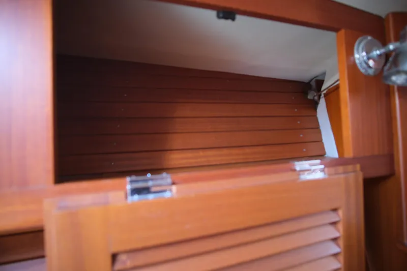 Georgia B Yacht Photos Pics Wooden interior cabinet of 2000 Hallberg-Rassy 42F Mk II sailboat.