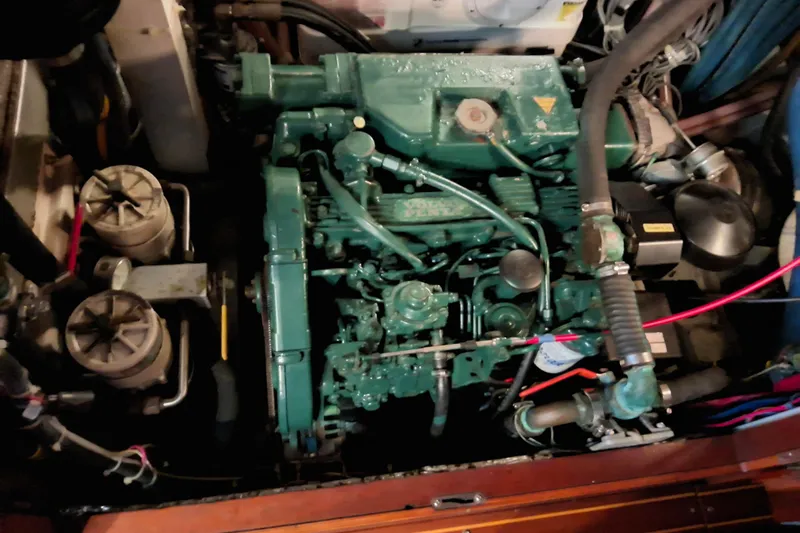 Georgia B Yacht Photos Pics Engine compartment of a 2000 Hallberg-Rassy 42F Mk II sailboat, featuring a Volvo Penta engine.