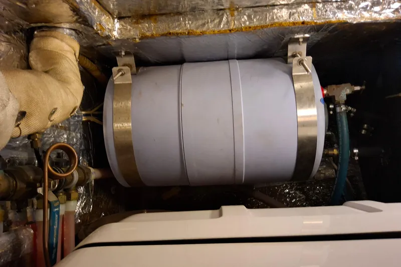 Georgia B Yacht Photos Pics Engine room of 2000 Hallberg-Rassy 42F Mk II with mounted cylindrical tank.