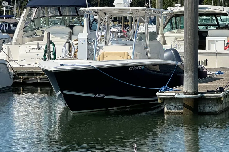 Lady Michelle Yacht Photos Pics 2012 Jupiter 29 FS CC boat docked in marina, surrounded by other vessels.