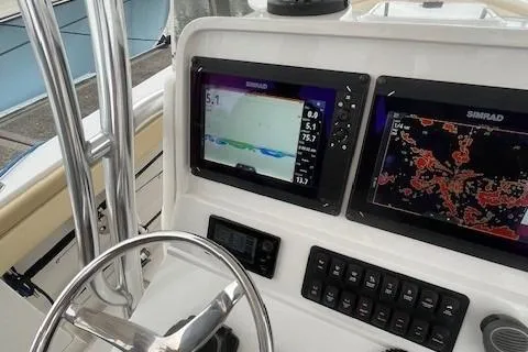 Lady Michelle Yacht Photos Pics 2012 Jupiter 29 FS CC boat dashboard with Simrad navigation displays.
