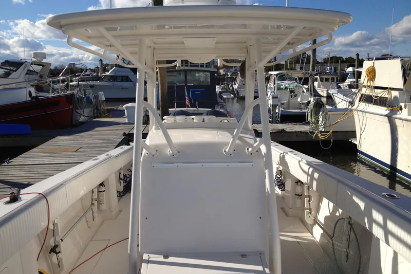 Lady Michelle Yacht Photos Pics 2012 Jupiter 29 FS CC boat docked at marina, surrounded by other vessels.