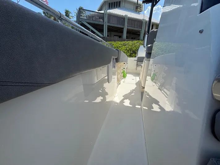  Yacht Photos Pics 2023 Stingray 273 CC boat interior with sleek design and modern features.