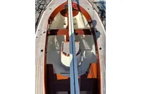 2007 Latitude 46 Tofinou 7 sailboat interior with wooden accents and sleek design.