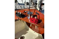 Close-up of 2007 Latitude 46 Tofinou 7 sailboat deck with ropes and winch.
