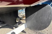 Close-up of 2007 Latitude 46 Tofinou 7 sailboat's rudder and propeller on dry dock.